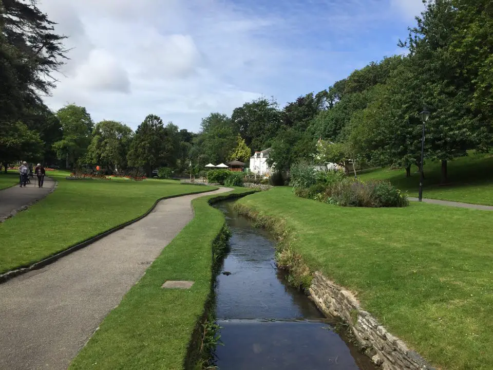 Trenance gardens, Newquay, things to do with kids in Newquay. Walking through Trenance gardens, Newquay along the stream.