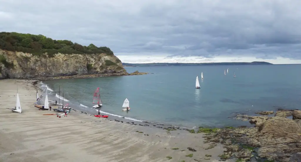 Yachts setting out from Porthpean Beach, Cornwall