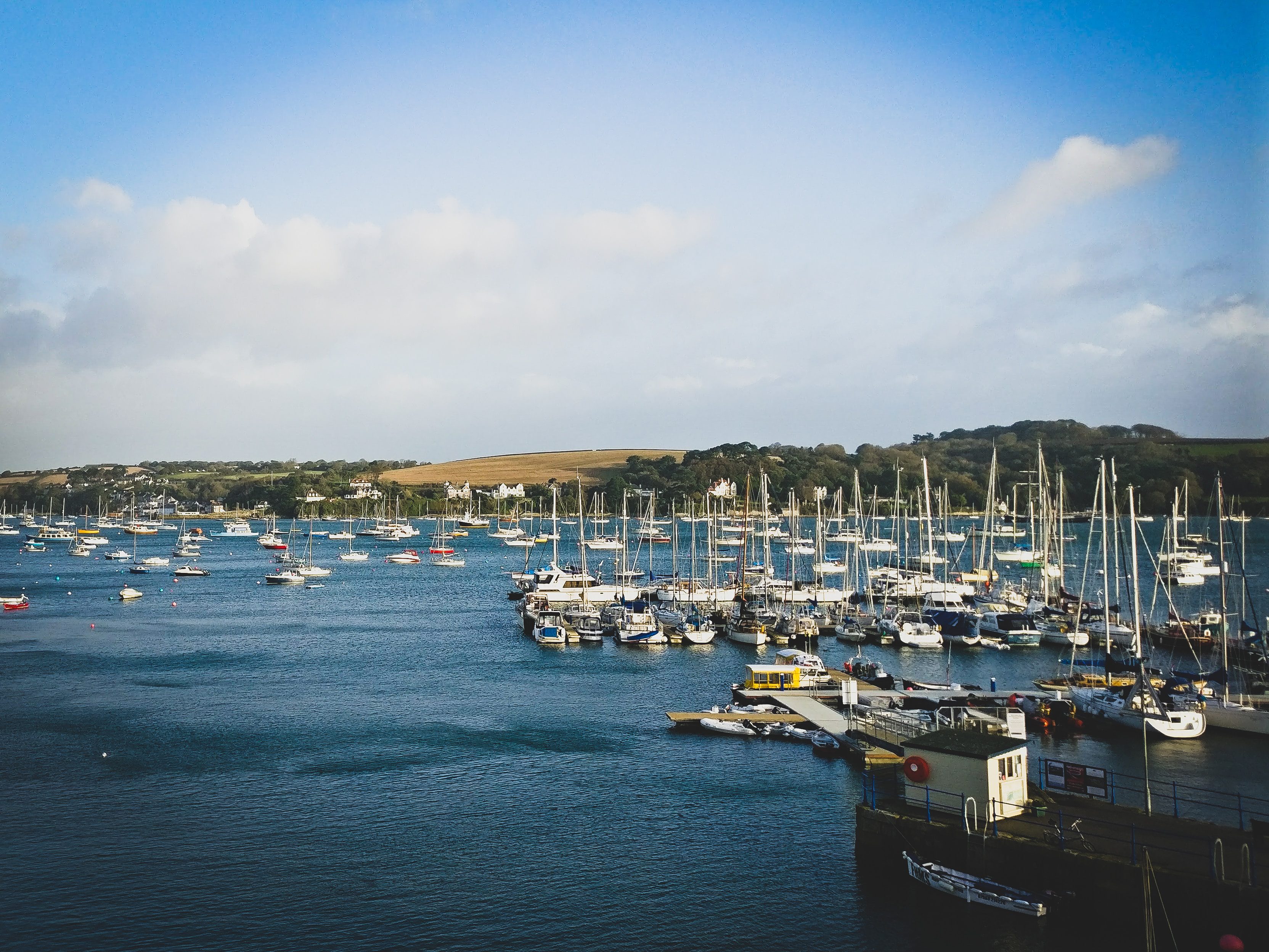 white and black boat on sea during daytime, falmouth, things to do in cornwall, cornwall towns